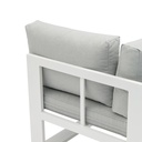 Modulo rincon Niland alu blanco y cojineria gris claro.